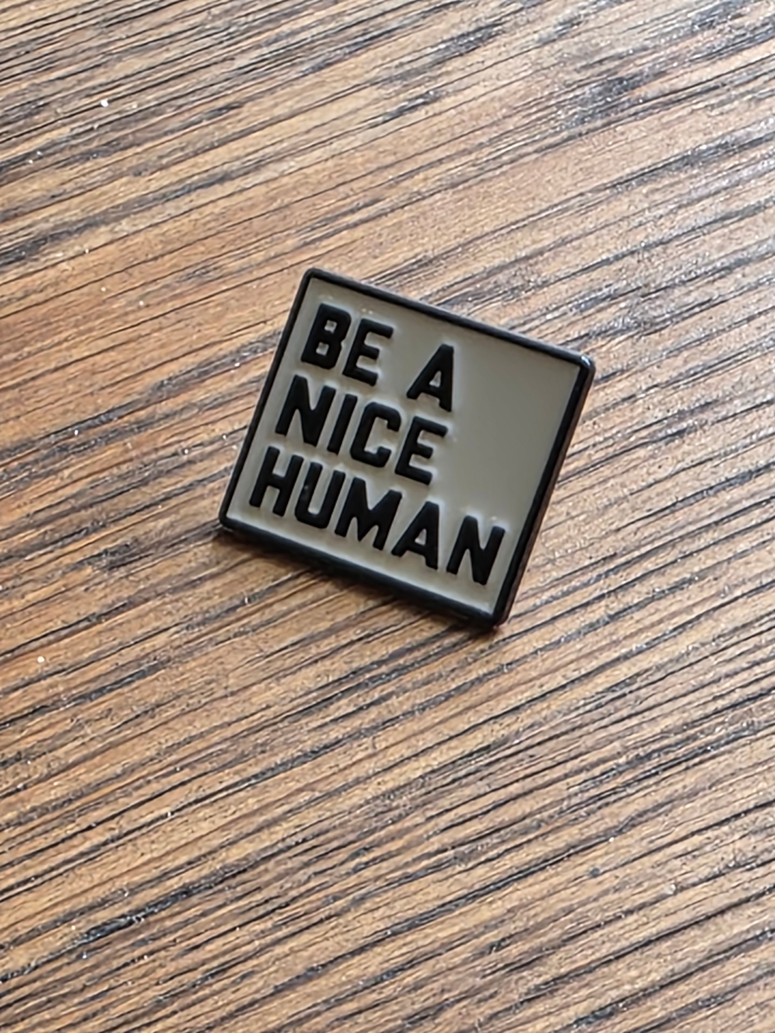 Be a Nice Human - Black pin badge