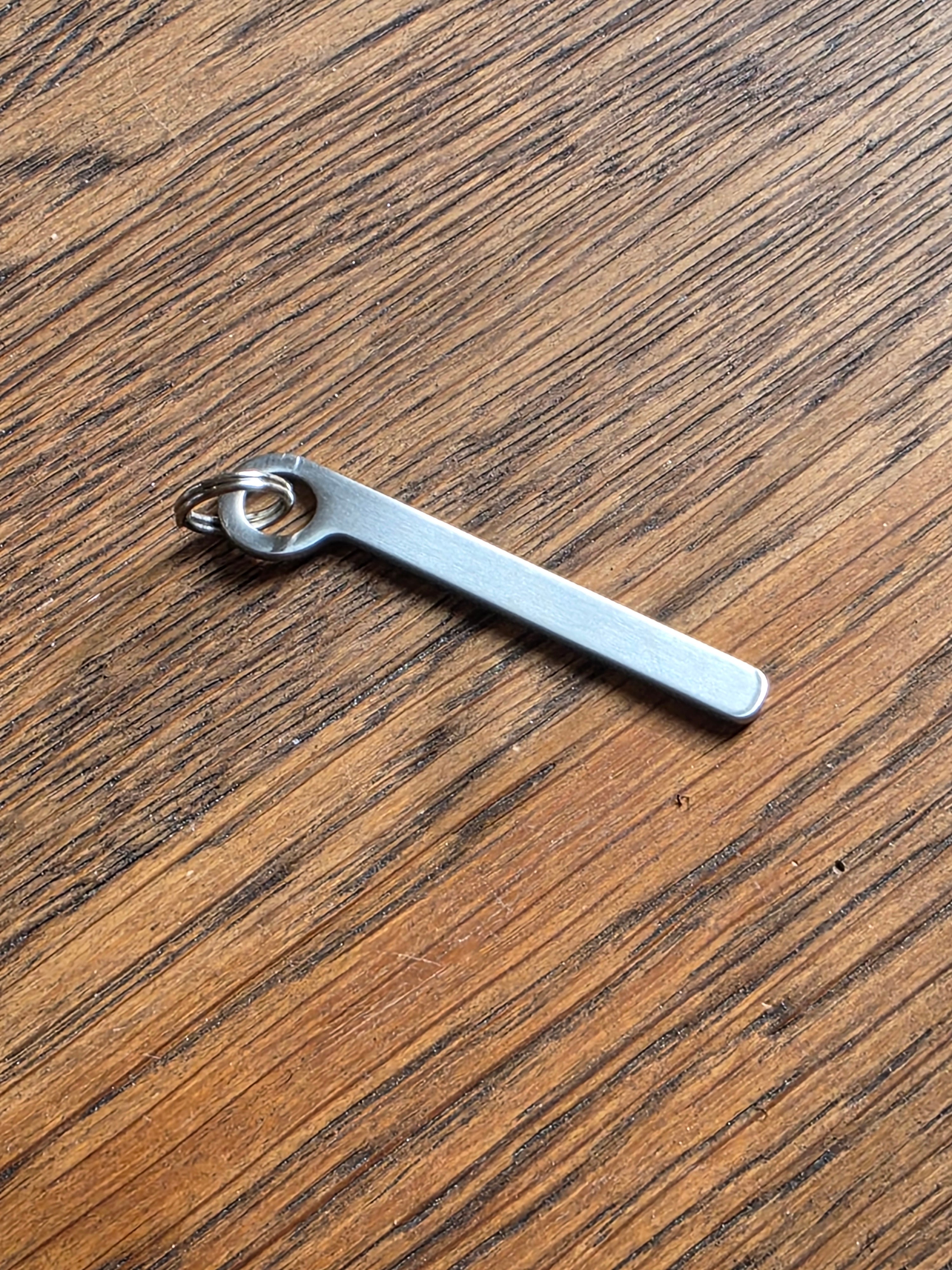 Titanium Rule Keyring - Customizable